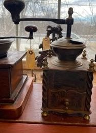 Adams Coffee Grinder, Brass coffee grinder, and wooden and iron, no name grinder.